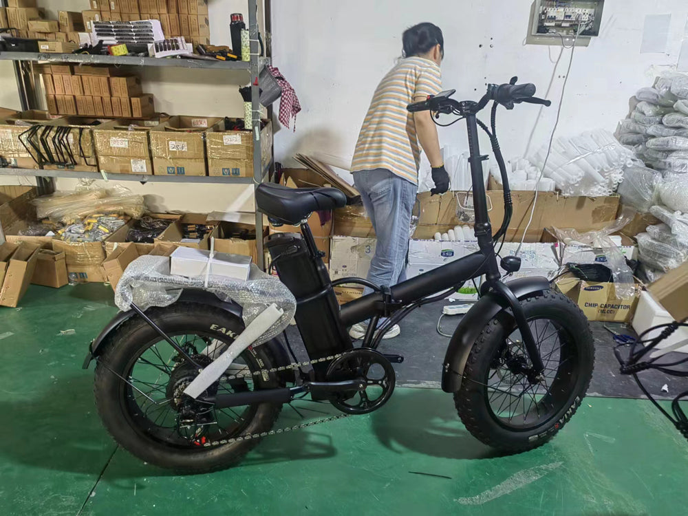 Foldable high carbon steel ebike - 500watt motor, foldable frame, portable battery, 30km/h